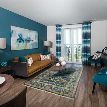 a living room with a couch and a table